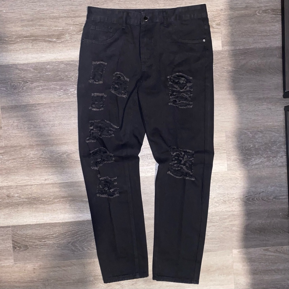 Black distressed denim jeans